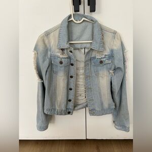 Distressed denim jacket